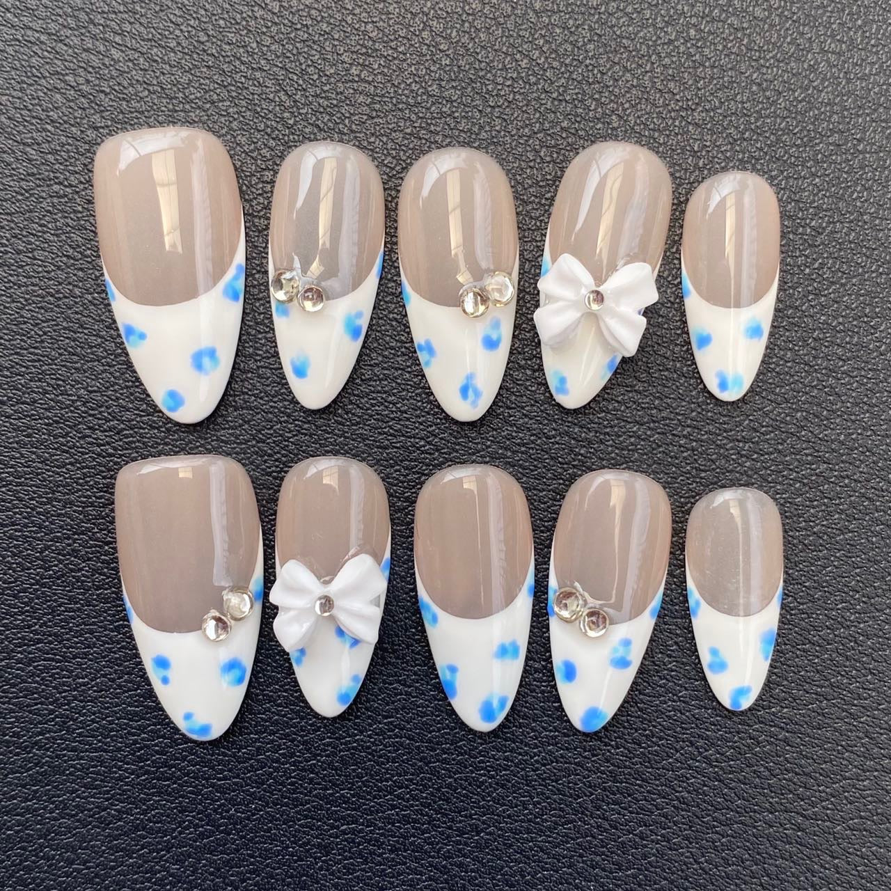 Blue and White Flower Fingertips