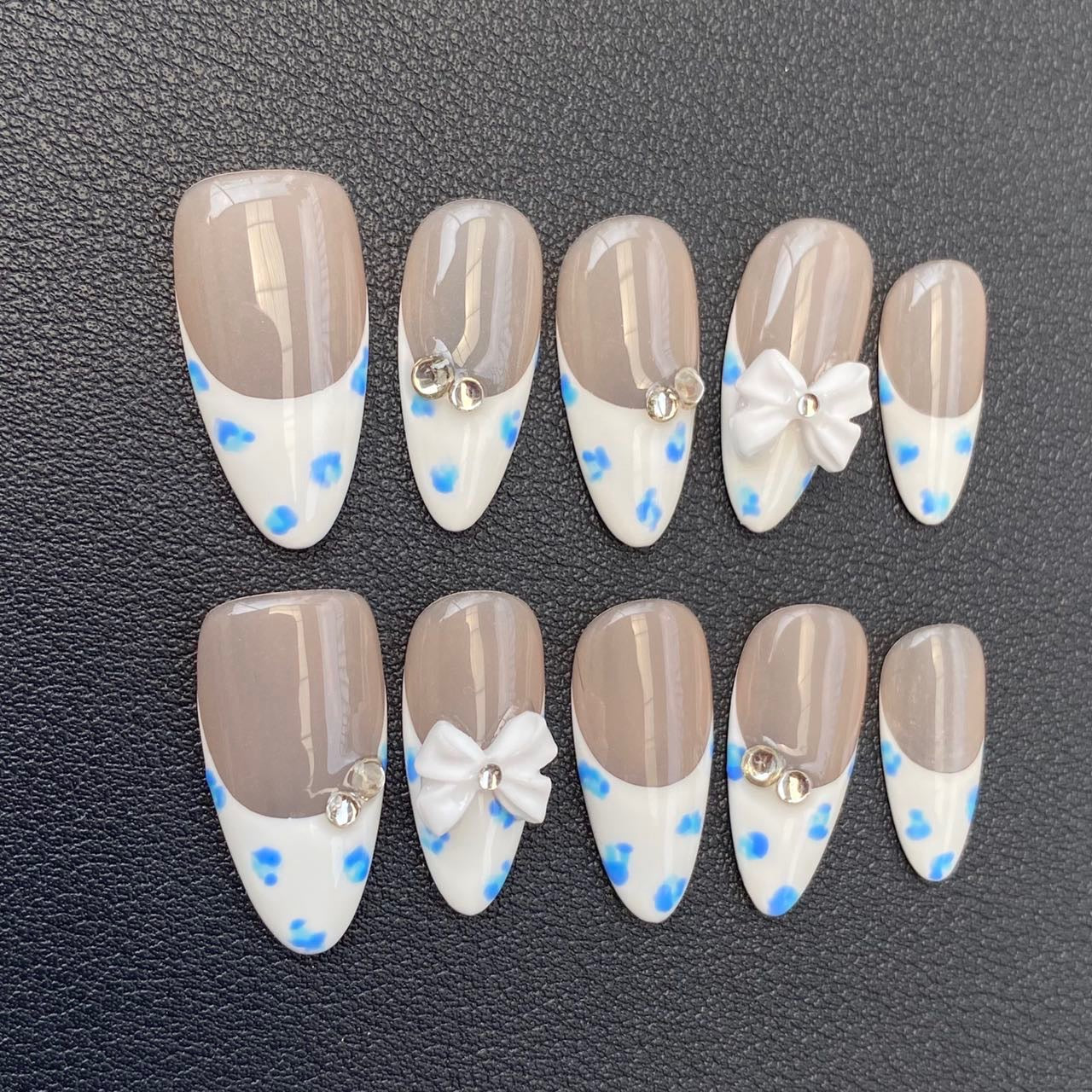 Blue and White Flower Fingertips